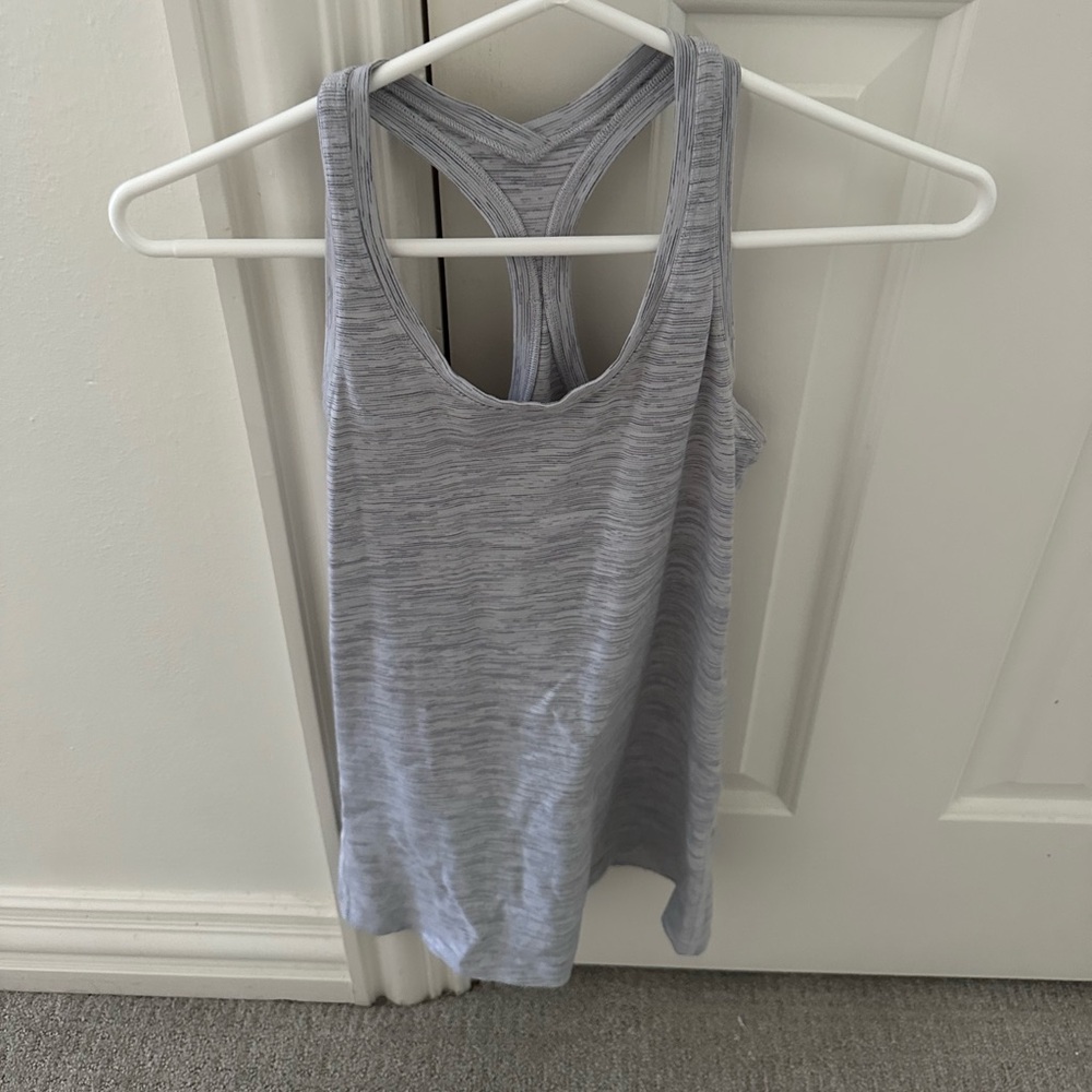 Light gray striped lululemon tank top.